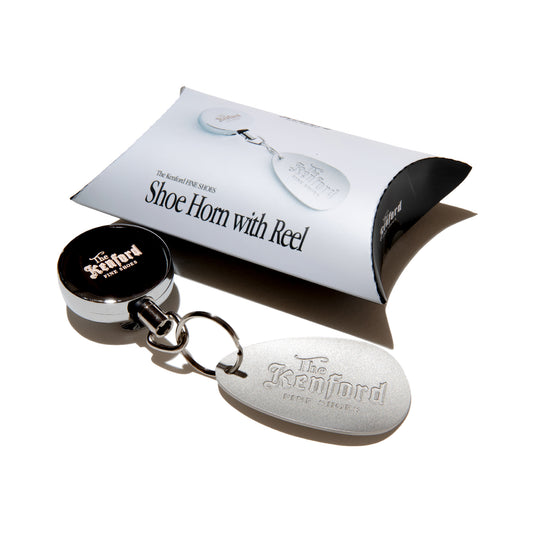 SHOE HORN WITH REEL